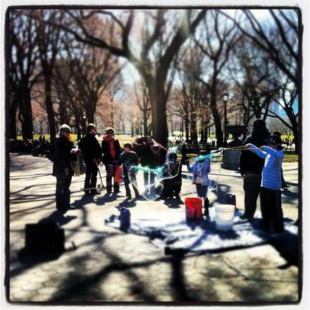 People in Central Park in raking winter light