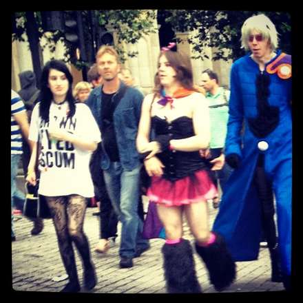 People in costume on the city streets
